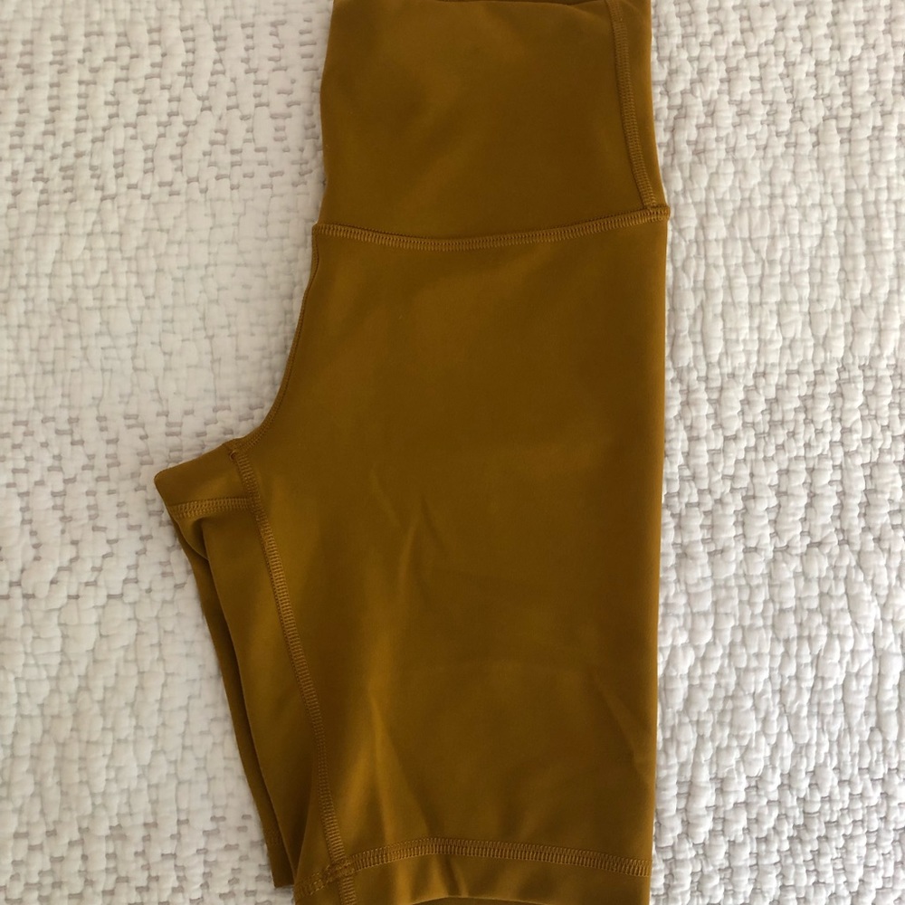 lululemon mustard yellow 7” inseam bike shorts, size 4, like-new condition